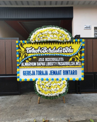 Papan Bunga Duka di Garuda